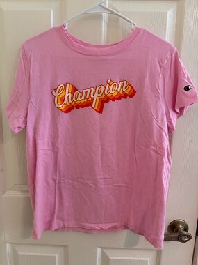 Champion Pink Short Sleeve Tee with Retro Yellow-Orange Logo